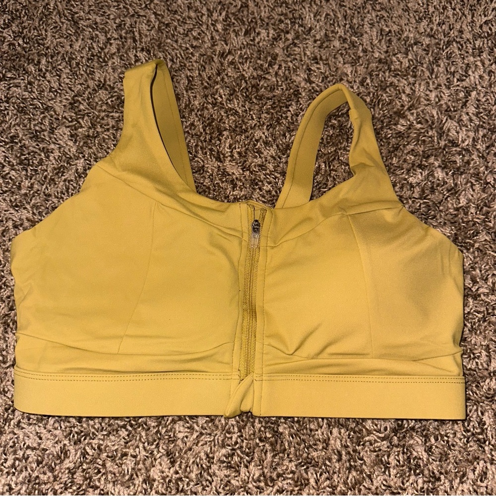 Size medium zip front sports bra -new